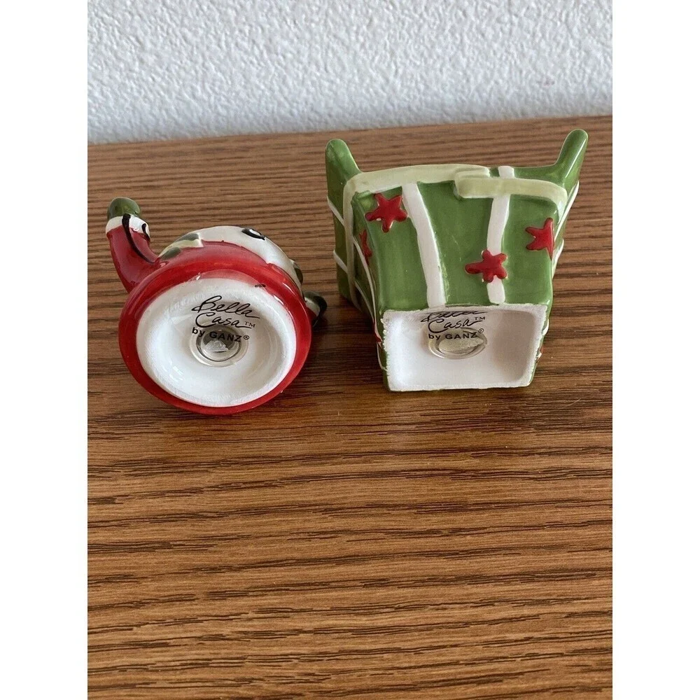 Bella Casa by Ganz 2 Piece Santa on Christmas Gift Salt & Pepper Shakers NIB